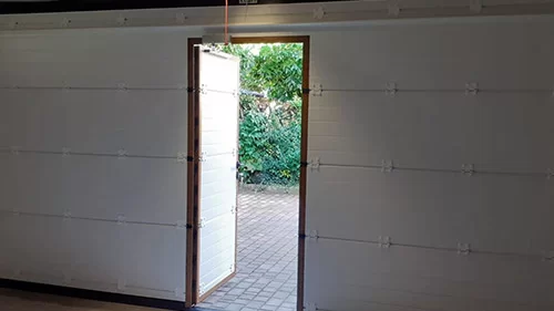 portone basculante con porta pedonale Ferrara